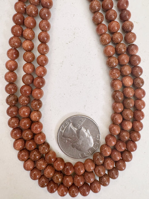goldstone, 6mm round, 15