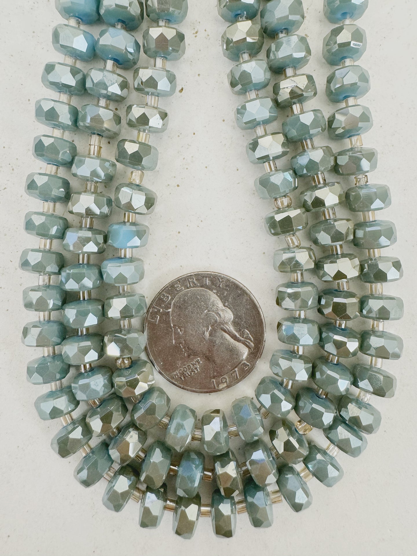 brown flash coated pastel blue, fancy cut, vintage look glass, 8x5mm edge faceted heishi rondelle, 10