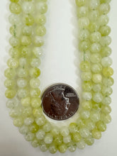 lemon lime green color enhanced quartz, 6mm round, 15" strand, sold per strand