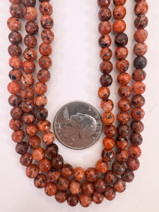 red orange color enhanced serpentine, 6mm faceted round, 15