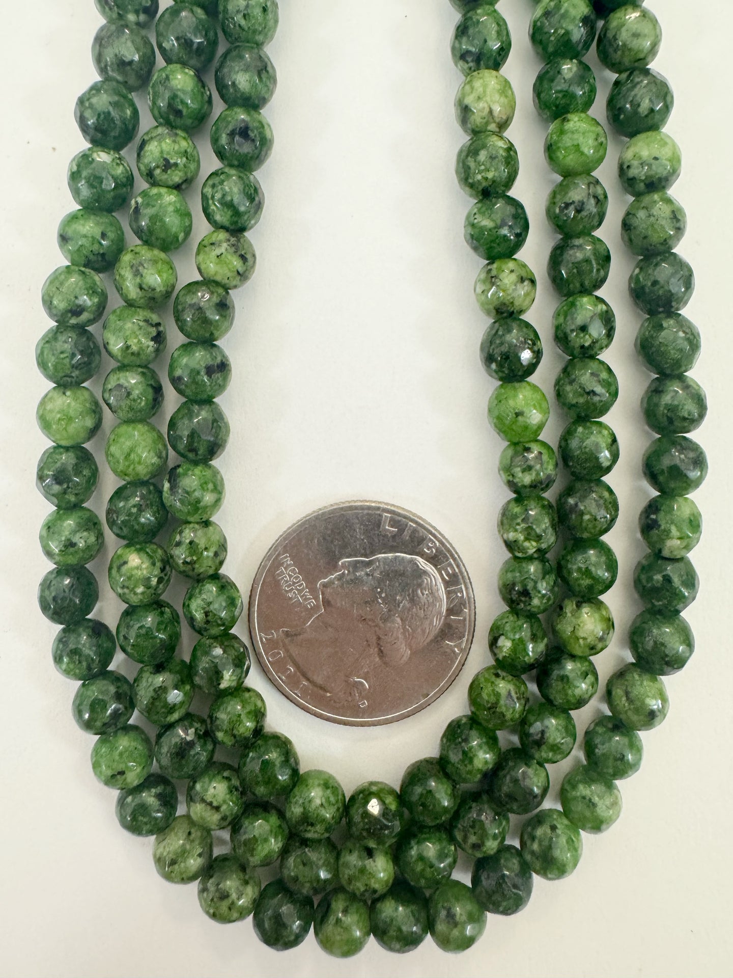 dark green color enhanced serpentine, 6mm faceted round, 15