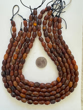red golden vintage stock horn, 12x9mm barrel, 15" strand, SOLD PER STRAND