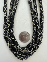 black off white, x motif, vintage stock bone, 12x7mm tube, 15" strand, SOLD PER STRAND