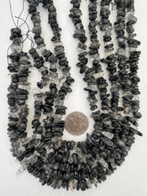 black rutilated quartz, 10mm mixed chips, 15" strand, SOLD PER STRAND