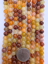 multi tone red aventurine, 8mm round, 15" strand, SOLD PER STRAND