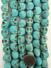 stabilzed turquoise, 17x17x14mm skull, 15" strand, SOLD PER STRAND