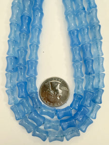pale bright blue color enhanced quartz, 12x8mm concave tube, 15" strand, sold per strand