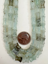 pale aqua blue color enhanced quartz, 12x8mm concave tube, 15" strand, sold per strand