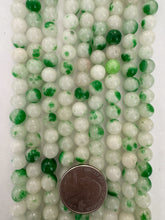 color enhanced quartz: green off white, 8mm round, 15" strand,  SOLD PER STRAND