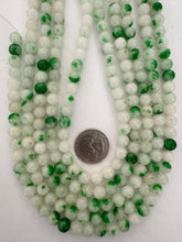 color enhanced quartz: green off white, 8mm round, 15" strand,  SOLD PER STRAND