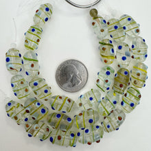 clear blue green orange yellow, dotted motif, vintage stock glass, 19x10mm bowed tube raised dots, 6" strand, SOLD PER STRAND