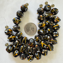 black white yellow red, dotted swirl motif, vintage stock glass, 14mm round raised dots, 6" strand, SOLD PER STRAND