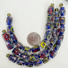 clear blue multi, inside line millefiori motif, vintage stock glass, 14x10mm tube, 6" strand, SOLD PER STRAND