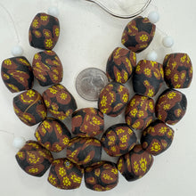 matte brown yellow black millefiori motif, vintage look glass, 24x18mm bowed barrel mix,   6" strand, SOLD PER STRAND