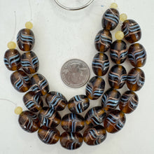 brown pale blue copper, drawn swirl motif, vintage stock glass, 20x14mm barrel,   6" strand, SOLD PER STRAND