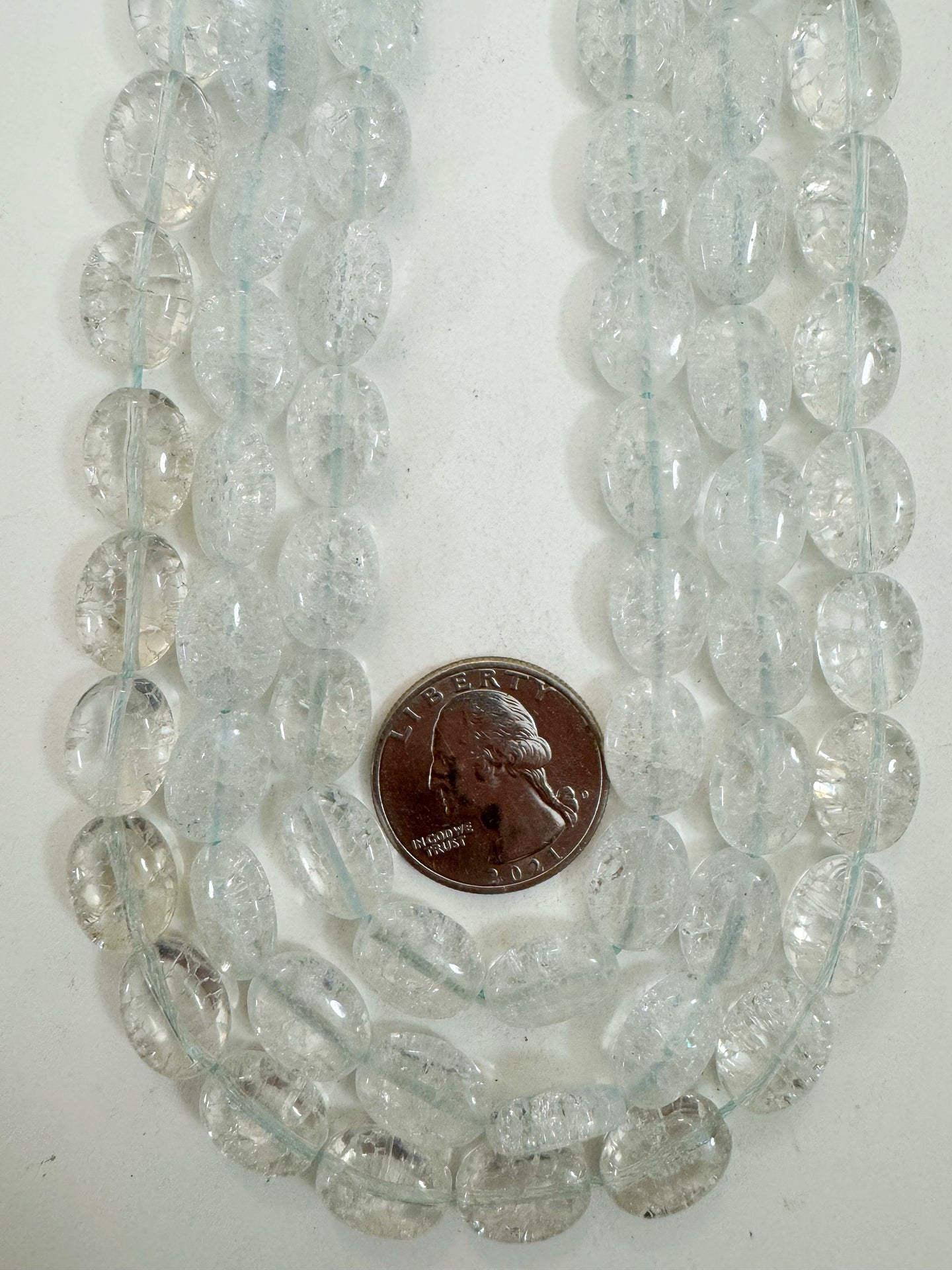 very light aqua blue color enhanced crackle look quartz, 14x10x6mm oval, 15