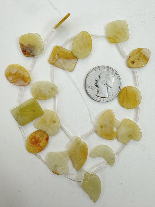 natural serpentine, 18-20mm shape animal and nature motifs, 15