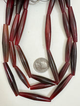 red horn, 34-52mm random assortment tube, 15" strand, sold per strand,