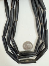 black horn, 25-40mm random assortment tube, 15" strand, sold per strand