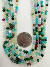 color enhanced quartz: green blue yellow multi, 4mm faceted round, 15" strand,  SOLD PER STRAND
