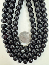 black, single color, vintage look resin, 11x10mm rondelle, 15" strand, sold per strand