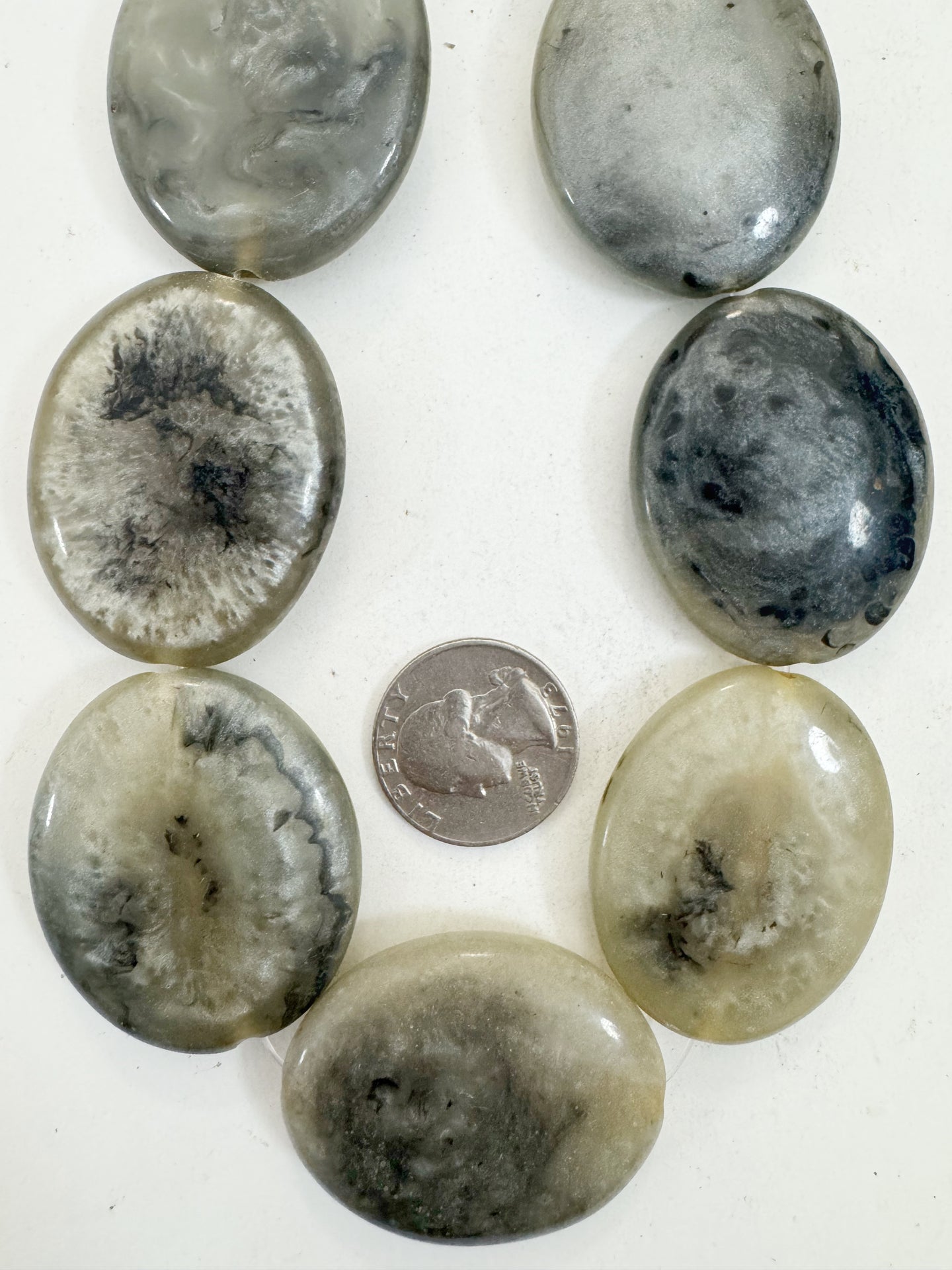 pearly pale yellow gray black swirl, vintage look resin, 42x34x9mm oval, 15