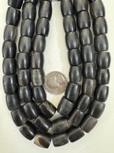 black faint off white, faux bone motif, vintage look resin, 14x12mm barrel, 15" strand, sold per strand