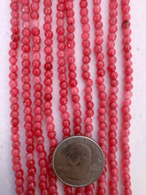 color enhanced quartz: dark pale strawberry pink, 4mm faceted round, 15" strand,   SOLD PER STRAND