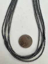 hematite, 2mm barrel, 15" strand,   SOLD PER STRAND