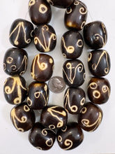 dark brown off white flower motif, faux bone, vintage look resin, 35x29mm barrel tube, 15" strand, sold per strand