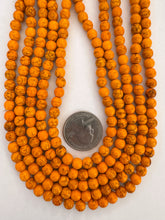 color enhanced magnesite: bright tangerine orange, 6mm round, 15" strand, SOLD PER STRAND