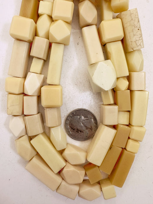 off white 4 sided  mix, faux bone, vintage look resin, 15