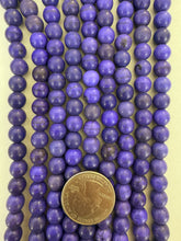 color enhanced magnesite: dark pale blue purple, semi dull finish, 8mm round, 15" strand,  SOLD PER STRAND