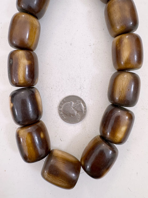 dark chocolate brown peach off white, faux bone, vintage look resin, 27x22mm barrel, 15