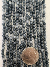 color enhanced quartz: multi tone blue gray, 4mm faceted round, 15" strand,   SOLD PER STRAND