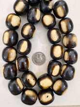 dark chocolate brown off white stripe, faux bone, vintage look resin, 26x23mm barrel, 15" strand, sold per strand