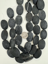 matte black stone, 35x25x5mm oval, 15" strand, sold per strand, surface wear