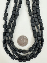 matte black stone, 8x8x4mm square, 15" strand, sold per strand, surface wear