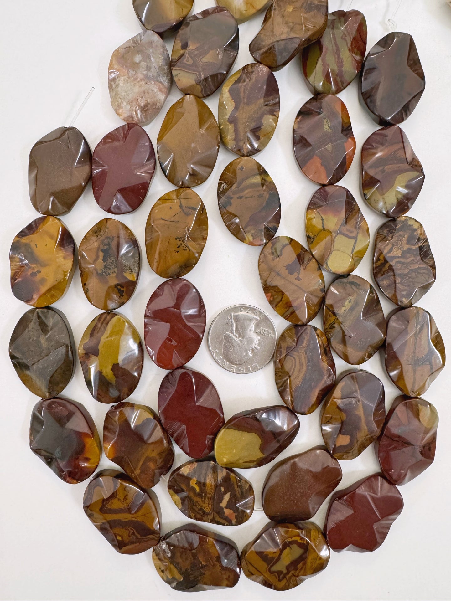 red wooden jasper, 30x21x6mm wavy oval, 15
