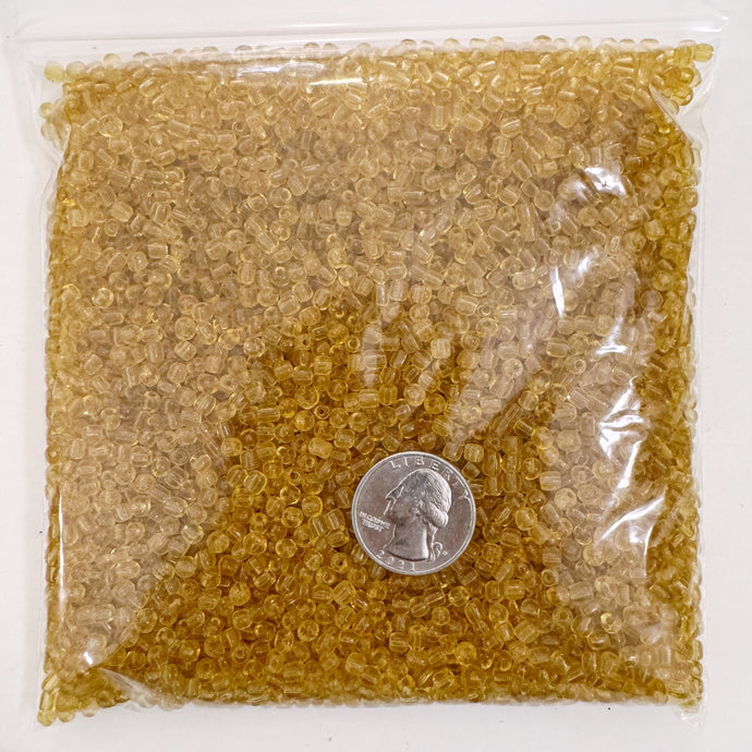 amber orange, glass, 3mm shape mix seed beads, approximately 500 gram bag, sold per bag, made in India