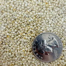 pearly orange off white, glass, 2mm rondelle seed beads, approximately 500 gram bag, sold per bag, made in India