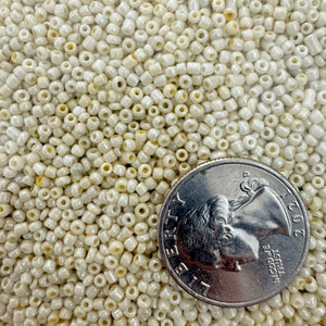 pearly orange off white, glass, 2mm rondelle seed beads, approximately 500 gram bag, sold per bag, made in India