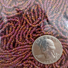 AB coated raspberry red, glass, 2mm rondelle seed beads, approximately 500 gram bag, sold per bag, made in czech republic