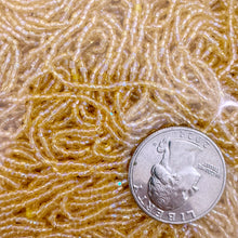 AB flash coated amber orange champagne, glass, 1.8mm tube seed beads, approximately 500 gram bag, sold per bag, made in czech republic