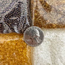 metallic dark copper cloudy clear amber orange, glass, 2mm rondelle mix seed beads, approximately 438 gram bag, sold per bag, made in india