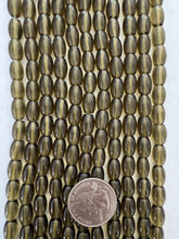 smokey quartz, 9x7mm barrel, 15" strand,  SOLD PER STRAND