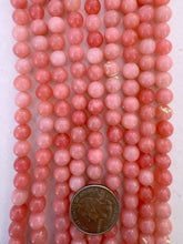 color enhanced quartz: coral pink, 8mm round, 15" strand, SOLD PER STRAND (some beads have dried rubber band on surface)