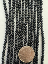 onyx, 4mm round, 15" strand,   SOLD PER STRAND