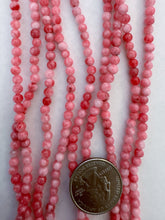 color enhanced quartz: lighter and darker red pink, 4mm round, 15" strand,  SOLD PER STRAND