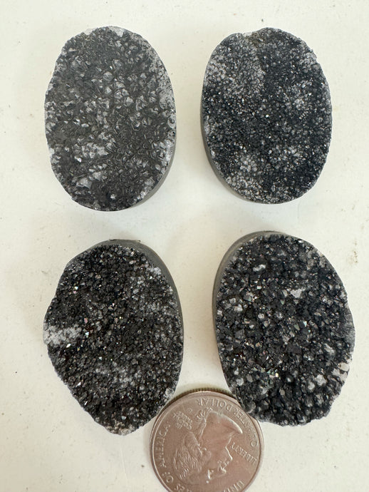 metallic black titanium coated druzy quartz, 35x25x12mm top to bottom drilled oval, sold per bead, may have edge or surface wear